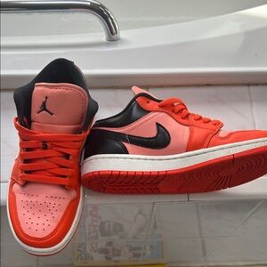 Air Jordan Black and Fire orange and sorbet Sneakers
